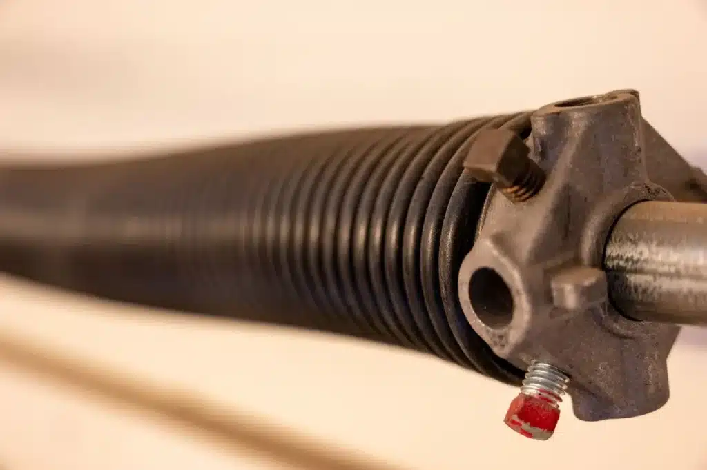 how to change garage door spring